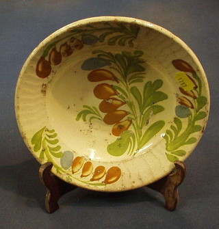 A 19th Century Continental Earthenware plate decorated stylised grapes 8"