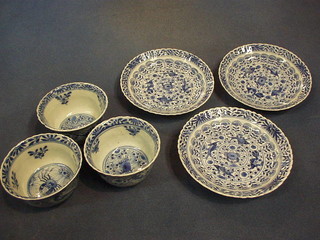 3 19th Century Oriental blue and white tea bowls and saucers, the interior painted crabs, the bases with 4 character mark