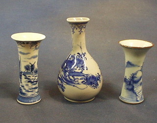 An Oriental blue and white porcelain club shaped specimen vase, 6" a waisted blue and white Oriental vase decorated landscape 3 1/2" and a Delft specimen vase decorated Windmills 4"