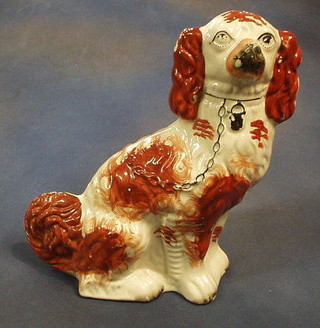 A 19th Century Staffordshire figure of a seated Spaniel 13" (cracked)