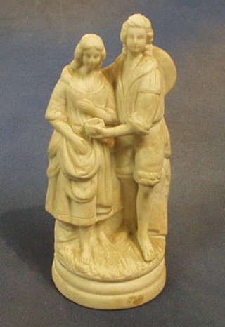 A 19th Century Parian figure of standing lady and gentleman 8"