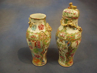 A pair of 19th Century Canton famille rose porcelain urns (1 with cover) 10"