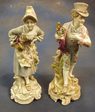 A pair of 19th Century porcelain figures of Gallant and Belle 16" the bases marked PF