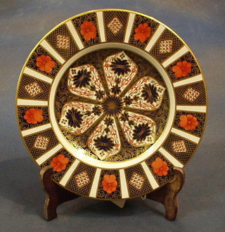 A Crown Derby Imari pattern plate, the base marked XXVIII 9"