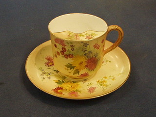 A  Victorian Royal Worcester moustache cup and saucer with peach blush ivory ground and floral decoration, the base with purple Worcester mark and 12 dots