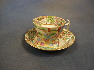 A set of 5 Canton famille rose cups and saucers decorated court figures