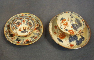 A set of 6 Japanese Imari porcelain teabowls and saucers with floral decoration and a set of 6 Japanese Imari porcelain tea bowls decorated figures (1 teabowl f)