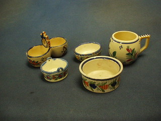 A Quimper twin handled dish and a collection of Quimper