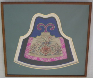 A 19th Century Oriental embroidered panel depicting a fabulous bird, 13" (shaped)