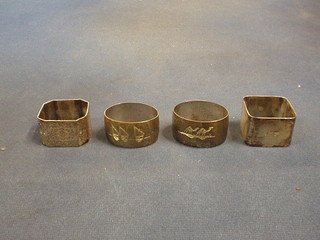 2 silver napkin rings and 2 Eastern silver napkin rings