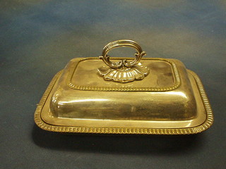 An oblong silver plated entree dish