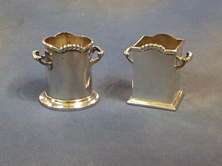 A square silver plated twin handled soda siphon holder by Harrods 2 1/2" and a circular ditto
