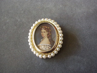 A modern Continental enamelled portrait brooch contained in a gilt metal and simulated pearl brooch/pendant mount