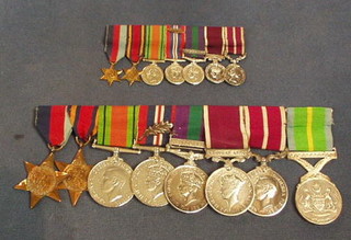 A  group of 8 medals to 1422476 Bombardier, Later Major E Digby Royal Artillery R.E.M.E. comprising 1939-45 Star, Burma Star, Defence Medal, War Medal with mention in dispatches, George VI Issue Army and RAF General Service medal 1918-1964 1 Bar Malaya, George VI issue Army Long Service Good Conduct Medal, George VI issue Meritorious Service medal, Federation of Malaya Active Service medal together with an associated group of miniature medals and letter regarding the Malay medal