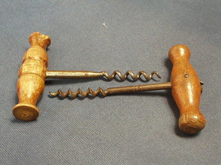 2 19th Century steel and wooden turned corkscrews