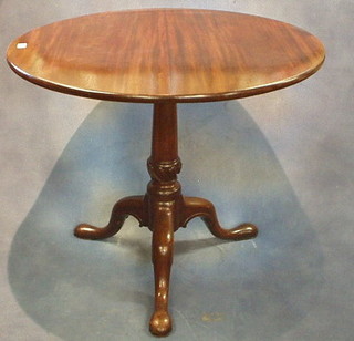 A 19th Century circular snap top bird cage table, raised on gun barrel column and tripod supports (purchased at Thomas H Kerr) 34"
