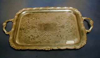 An oval silver plated tea tray and a cake stand