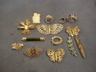 A jade coloured figure 2", a micro mosaic brooch, a circular "pearl" brooch, 5 filigree brooches and a small collection of costume jewellery