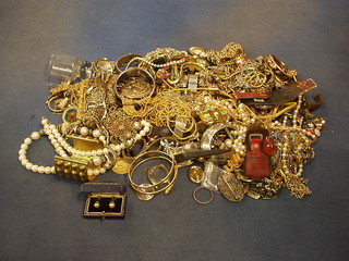 A quantity of costume jewellery and a picture made up of clock parts