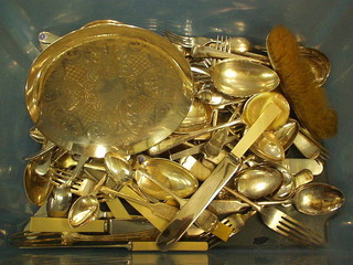 A collection of silver plated flatware