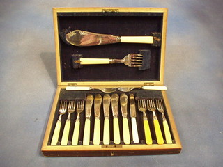 A part set of silver plated fish knives and forks