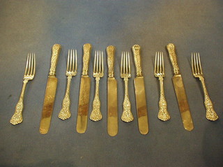 A set of 6 handsome Tiffany Sterling  forks cast Grecian decoration, monogrammed, the reverse marked 111 Tiffany & Co Sterling patent 1878 together with 5 Tiffany Sterling silver handled knives decorated Bachanaian scenes, blades by J C Rogers & Son Cutlers to HM The Queen