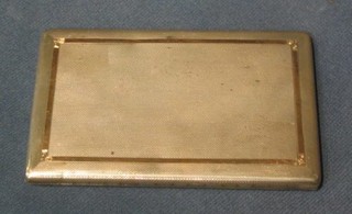 A silver cigarette case inlaid gold with engine turned decoration Birmingham 1947