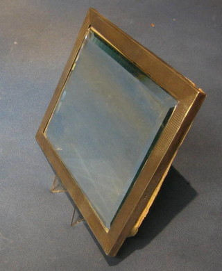 A silver easel frame with engine turned decoration fitted a bevelled plate mirror 10" x 7" Birmingham 1919