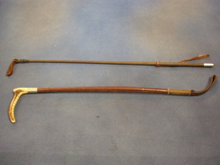 A riding crop with stag horn handle and a riding whip