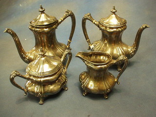An American silver plated 4 piece coffee service with 2 coffee pots, lidded sugar bowl and cream jug