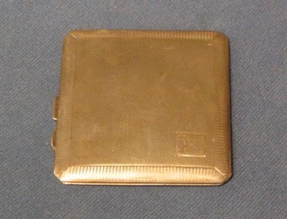 A silver cigarette case with engine turned decoration Chester 1931