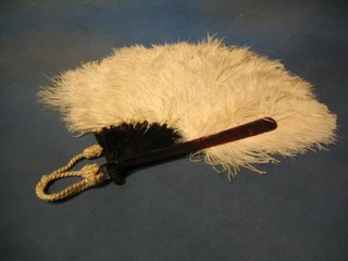 A tortoiseshell and ostrich feather fan