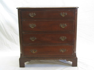 A Georgian style mahogany chest of 4 long drawers with canted corners, raised on bracket feet 29"