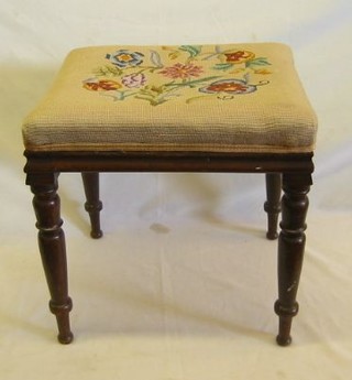 A 19th Century rectangular mahogany stool with Berlin wool work seat, raised on turned supports 18"