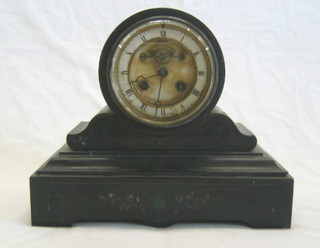 A 19th Century French 8 day striking mantel clock with visible escapement and Roman numerals contained in a drum shaped marble case