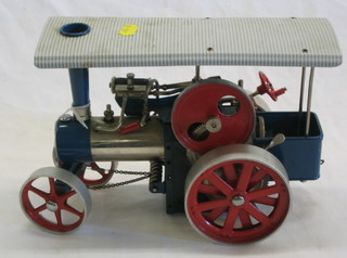 A Wilesco Traktor traction engine in blue and white livery