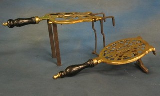 2 19th Century pierced brass range footman
