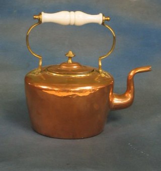 A copper kettle with white glass handle