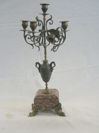 A 19th/20th Century Continental spelter 5 light candelabrum raised on a pink veined marble base (f) 19"