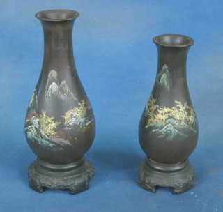 2 Oriental lacquered baluster shaped vases on hardwood stands, 9"