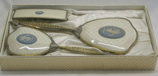 A 1950's 3 piece "silver" backed dressing table set with "Wedgwood" panels