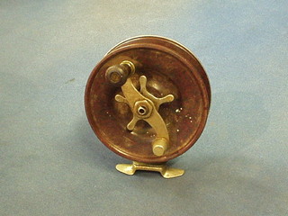 An Alvey brown Bakelite and stainless steel fly reel model no. 45C