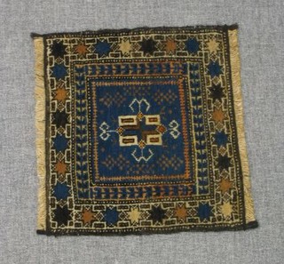 A small blue ground Belouch carpet 14" x 14"