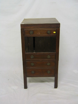A Georgian mahogany enclosed washstand with tambour shutter, fitted 3 long drawers, raised on square supports 18"