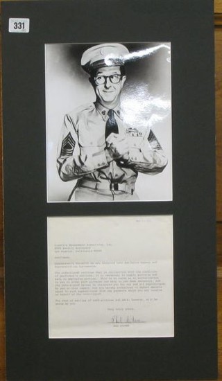 A black and white photograph of Phil Silvers as Sargent Bilco together with a letter to the Creative Management Association Inc 8899 Beverly Boulevard Los Angeles California dated 14 March 1974 and signed