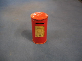 A money box in the form of a George V pillar box