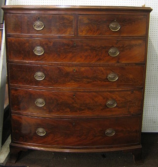 A 19th Century mahogany bow front chest of 2 short and 4 long drawers, raised on splayed bracket feet 42"