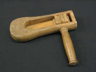 A wooden rattle