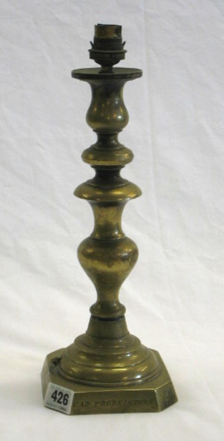 A 19th Century brass candlestick, the base engraved "To The Prince Albert or Friendly Society of Car Proprietors" converted to an electric table lamp 12"