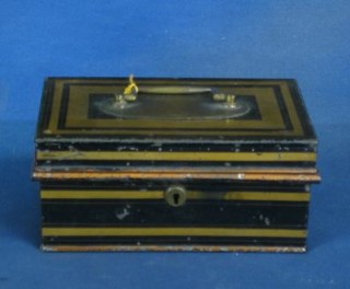An old metal cash box complete with key